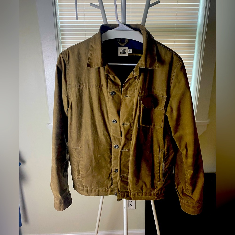 Medium flint and tinder flannel lined wax trucker jacket. Great condition.